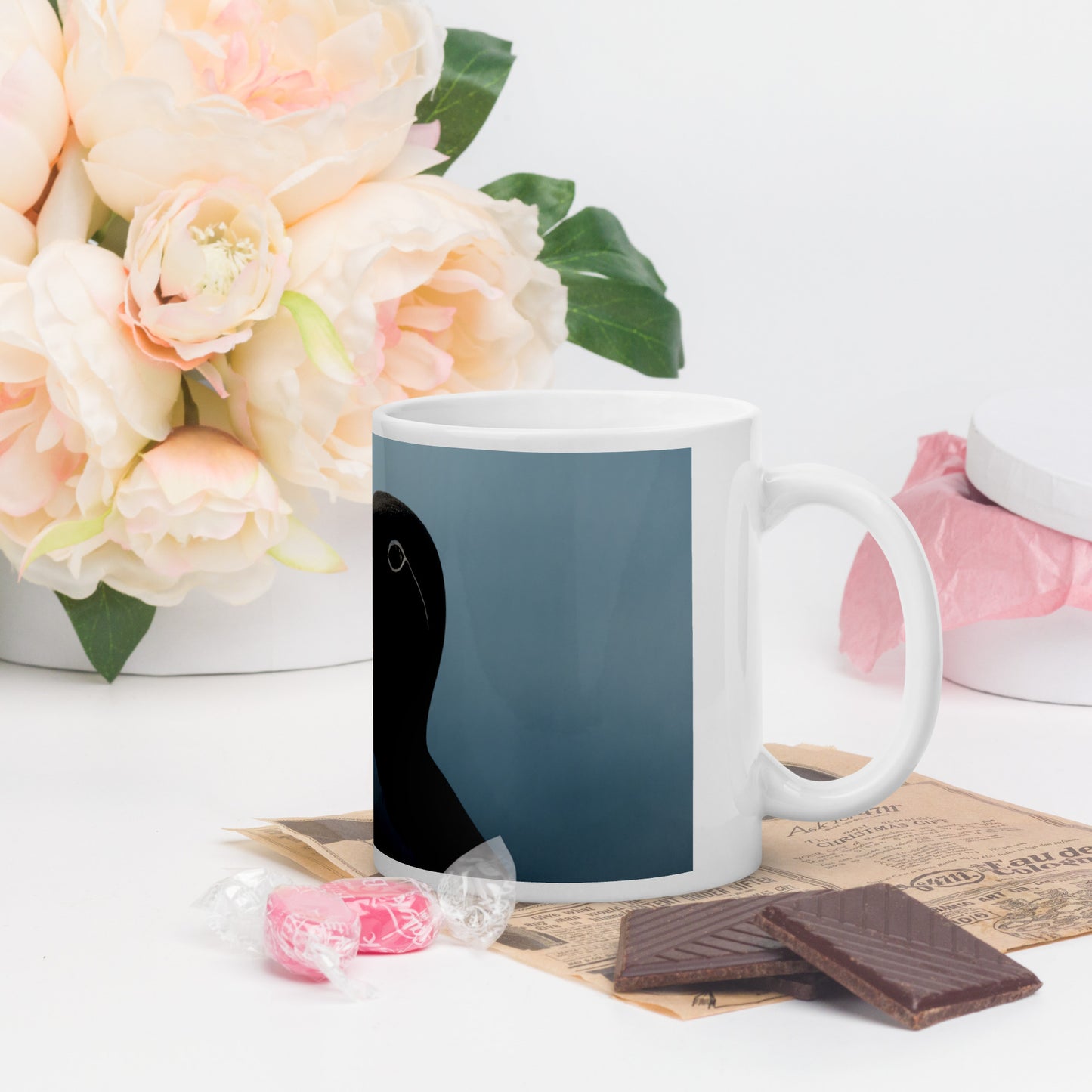 Portrait of a bridled common murre, displayed on a white glossy mug
